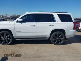 2015 Chevrolet Tahoe LS with VIN 1GNSCAKCXFR748554, listed as a IAAI auction lot 41765865 with 160,282 mi miles and . Bid and sale history available at DreamBid. Image 14.