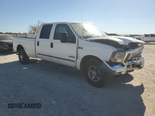 2000 Ford F-350 XL with VIN 3FTSW30F7YMA72223, listed as a Copart auction lot 81574774 with 203,727 mi miles and Salvage Title. Bid and sale history available at DreamBid. Image 4.