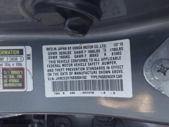 2011 Honda Insight EX with VIN JHMZE2H76BS004162, listed as a IAAI auction lot 41333373 with 287,593 mi miles. Bid and sale history available at carsss.com. Image 9.