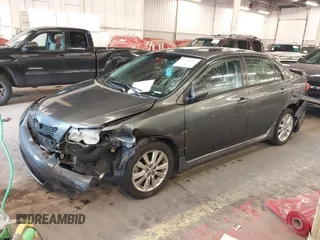 2010 Toyota Corolla with VIN 2T1BU4EE8AC510757, listed as a IAAI auction lot 41589152 with 164,857 mi miles. Bid and sale history available at carsss.com. Image 2.