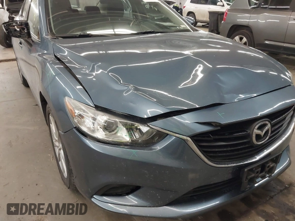 2015 Mazda 6 i Sport with VIN JM1GJ1U65F1170793, listed as a IAAI auction lot 41266146 with 125,701 mi miles and . Bid and sale history available at carsss.com. Image 6.