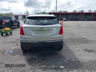 2019 Cadillac XT5 FWD z VIN 1GYKNARSXKZ242727, wystawiony jako IAAI lot #41669220 z przebiegiem 62 812 mil mil oraz . Historia ofert i sprzedaży dostępna na DreamBid. Obrazek 16.