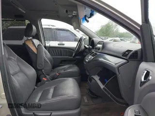 2007 Honda Odyssey EX-L with VIN 5FNRL38787B455417, listed as a IAAI auction lot 42104303 with 214,482 mi miles and . Bid and sale history available at DreamBid. Image 5.
