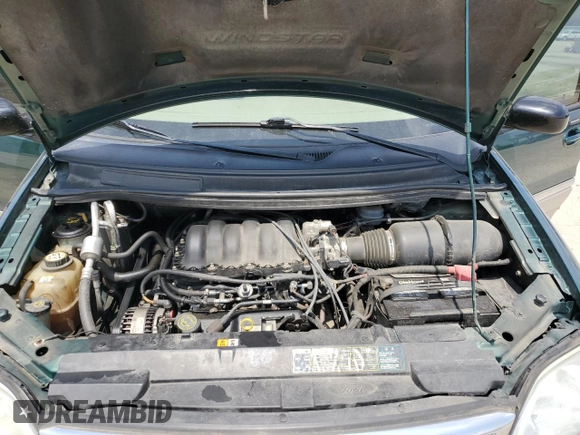 2003 Ford Windstar SEL z VIN 2FMDA53463BA29172, wystawiony jako Copart lot #56416405 z przebiegiem 124 800 mil mil oraz Szkoda całkowita • Salvage title. Historia ofert i sprzedaży dostępna na DreamBid. Obrazek 12.