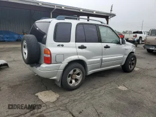 1999 Suzuki Grand Vitara JLX z VIN JS3TD62V9X4123460, wystawiony jako Copart lot #58574925 z przebiegiem 260 368 mil mil oraz Szkoda całkowita • Salvage title. Historia ofert i sprzedaży dostępna na DreamBid. Obrazek 3.