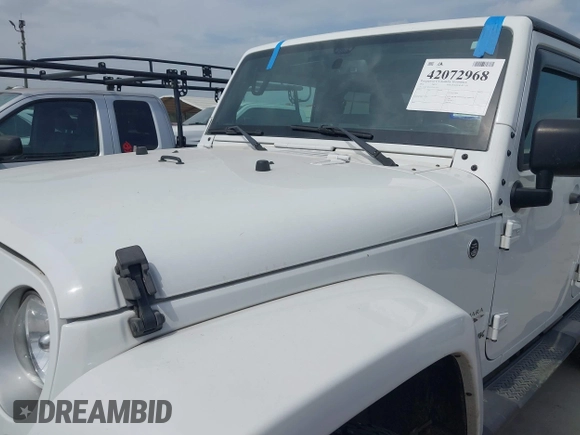 2018 Jeep Wrangler Unlimited Sahara with VIN 1C4HJWEG1JL801934, listed as a IAAI auction lot 42072968 with 112,432 mi miles and . Bid and sale history available at DreamBid. Image 6.