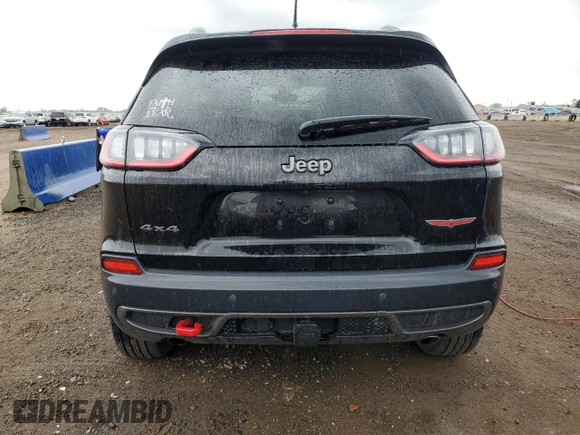 2020 Jeep Cherokee Trailhawk with VIN 1C4PJMBX2LD588381, listed as a Copart auction lot 56067055 with 82,467 mi miles and Salvage title. Bid and sale history available at DreamBid. Image 6.
