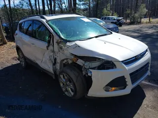 2016 Ford Escape SE with VIN 1FMCU0G9XGUB90670, listed as a IAAI auction lot 41694382 with 167,631 mi miles. Bid and sale history available at carsss.com. Image 1.
