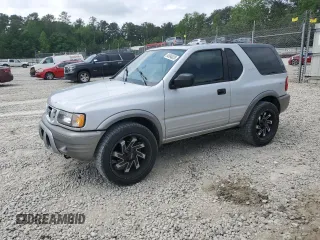 2002 Isuzu Rodeo z VIN 4S2CK57W324328043, wystawiony jako Copart lot #54584025 z przebiegiem 141 523 mil mil oraz Szkody całkowita. Historia ofert i sprzedaży dostępna na DreamBid. Obrazek 1.