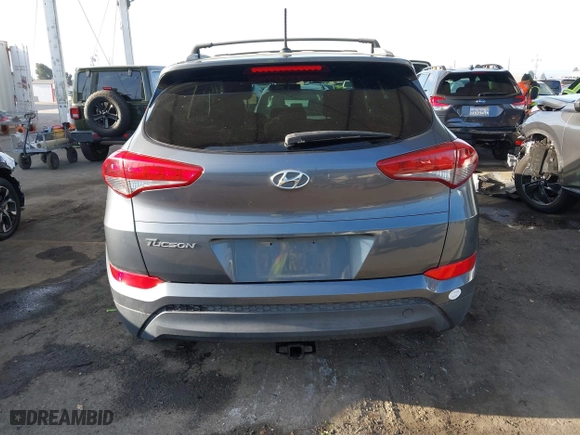 2017 Hyundai Tucson SE Plus with VIN KM8J33A40HU329666, listed as a IAAI auction lot 42084886 with 144,785 mi miles. Bid and sale history available at carsss.com. Image 16.