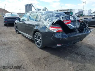 2018 Toyota Camry LE with VIN 4T1B11HK5JU076028, listed as a IAAI auction lot 41989266 with 215,235 mi miles. Bid and sale history available at carsss.com. Image 3.