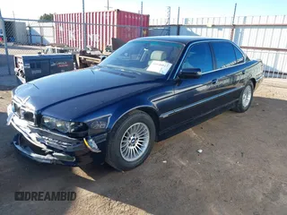2001 BMW 7 Series 740iL with VIN WBAGH83401DP20636, listed as a IAAI auction lot 41646017 with 60,098 mi miles. Bid and sale history available at carsss.com. Image 2.