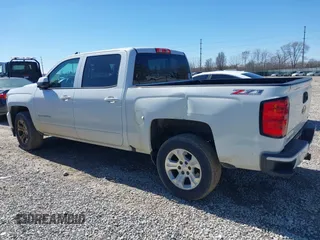 2017 Chevrolet Silverado 1500 LT with VIN 3GCUKREC3HG489701, listed as a IAAI auction lot 41814860 with 218,605 mi miles. Bid and sale history available at carsss.com. Image 14.