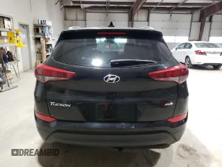 2018 Hyundai Tucson SEL z VIN KM8J3CA42JU743778, wystawiony jako Copart lot #46053665 z przebiegiem 166 977 mil mil oraz Szkoda całkowita • Salvage title. Historia ofert i sprzedaży dostępna na DreamBid. Obrazek 6.