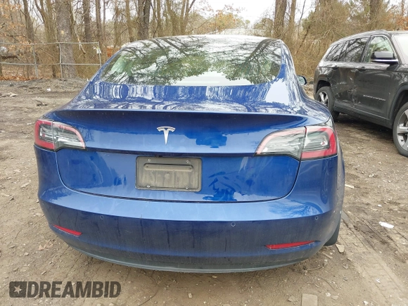 2020 Tesla Model 3 Standard Range Plus with VIN 5YJ3E1EA1LF658521, listed as a IAAI auction lot 41804722 with 83,248 mi miles and . Bid and sale history available at DreamBid. Image 16.