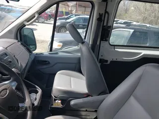 2015 Ford Transit Cargo with VIN 1FTNE2CMXFKA06516, listed as a IAAI auction lot 41650498 with 281,654 mi miles and . Bid and sale history available at carsss.com. Image 20.