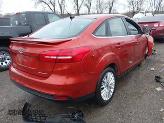 2018 Ford Focus Titanium with VIN 1FADP3J20JL280698, listed as a IAAI auction lot 41823530 with 54,841 mi miles and . Bid and sale history available at DreamBid. Image 4.