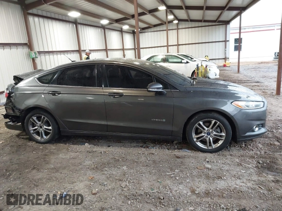 2015 Ford Fusion SE Hybrid with VIN 3FA6P0LU6FR248904, listed as a IAAI auction lot 41556607 with 224,799 mi miles. Bid and sale history available at carsss.com. Image 13.