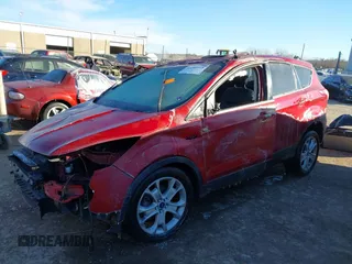 2014 Ford Escape Titanium with VIN 1FMCU9J98EUA77116, listed as a IAAI auction lot 41260418 with 153,831 mi miles. Bid and sale history available at carsss.com. Image 15.
