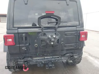 2021 Jeep Wrangler Unlimited Rubicon z VIN 1C4HJXFG8MW775419, wystawiony jako IAAI lot #41797178 z przebiegiem 56 166 mil mil oraz . Historia ofert i sprzedaży dostępna na DreamBid. Obrazek 6.