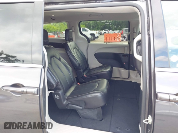 2023 Chrysler Pacifica Touring L with VIN 2C4RC1BG6PR612749, listed as a IAAI auction lot 42612932 with 69,931 mi miles and . Bid and sale history available at DreamBid. Image 8.