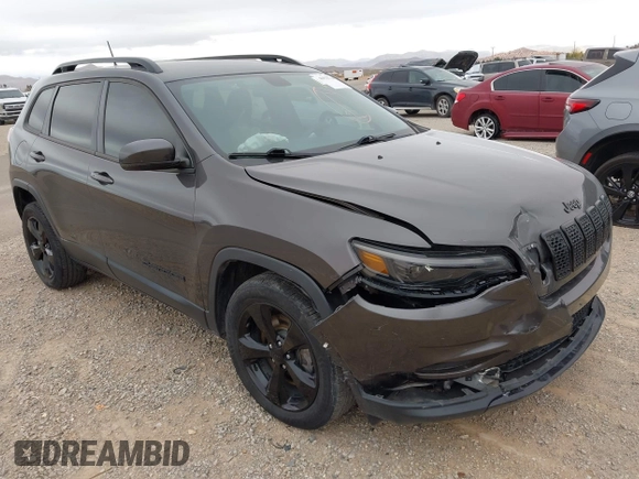2020 Jeep Cherokee Latitude Plus with VIN 1C4PJLLB2LD570914, listed as a IAAI auction lot 40933764 with 49,886 mi miles. Bid and sale history available at carsss.com. Image 1.