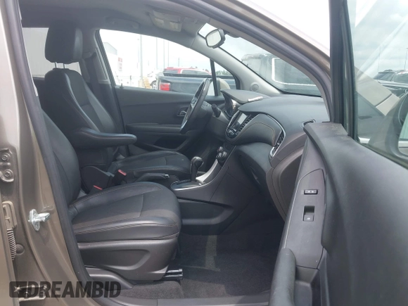 2020 Chevrolet Trax LT with VIN KL7CJLSB7LB351195, listed as a IAAI auction lot 42266365 with 64,257 mi miles and . Bid and sale history available at DreamBid. Image 5.
