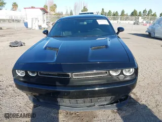 2021 Dodge Challenger SXT with VIN 2C3CDZAG9MH630736, listed as a IAAI auction lot 41633520 with 62,895 mi miles. Bid and sale history available at carsss.com. Image 13.