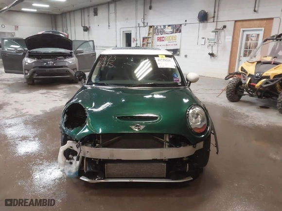 2015 MINI Cooper Hardtop S with VIN WMWXP7C57F2A39384, listed as a IAAI auction lot 41733215 with 60,750 mi miles. Bid and sale history available at carsss.com. Image 13.