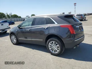 2018 Cadillac XT5 FWD with VIN 1GYKNARS5JZ155879, listed as a Copart auction lot 59568525 with 88,376 mi miles and Salvage title. Bid and sale history available at DreamBid. Image 2.