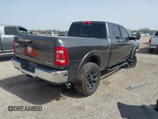 2019 Ram 2500 Laramie with VIN 3C6UR5FL2KG630341, listed as a IAAI auction lot 41742788 with 95,292 mi miles and . Bid and sale history available at DreamBid. Image 4.