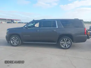 2018 Chevrolet Suburban Premier with VIN 1GNSCJKC5JR135265, listed as a IAAI auction lot 42028935 with 136,382 mi miles and . Bid and sale history available at DreamBid. Image 14.
