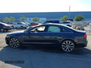 2014 Audi A6 2.0T Premium Plus with VIN WAUDFAFC1EN135678, listed as a IAAI auction lot 41361239 with 71,154 mi miles. Bid and sale history available at carsss.com. Image 14.