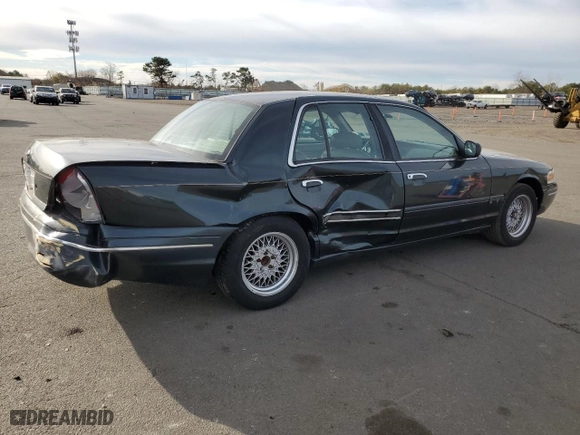 1999 Ford Crown Victoria LX with VIN 2FAFP74W7XX214966, listed as a Copart auction lot 80337724 with 134,624 mi miles and Salvage Title. Bid and sale history available at carsss.com. Image 3.