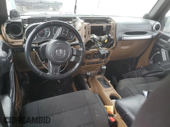 2011 Jeep Wrangler Unlimited Rubicon z VIN 1J4BA6H16BL615993, wystawiony jako Copart lot #55420275 z przebiegiem 200 403 mil mil oraz Szkoda całkowita • Salvage title. Historia ofert i sprzedaży dostępna na DreamBid. Obrazek 8.