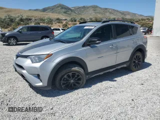 2018 Toyota RAV4 XLE with VIN 2T3RFREV2JW722386, listed as a Copart auction lot 61105335 with 69,480 mi miles and Salvage title. Bid and sale history available at DreamBid. Image 1.