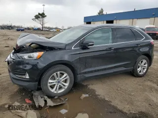 2020 Ford Edge SEL z VIN 2FMPK4J93LBA32811, wystawiony jako Copart lot #52017125 z przebiegiem 128 273 mil mil oraz Nie do naprawy. Historia ofert i sprzedaży dostępna na DreamBid. Obrazek 1.