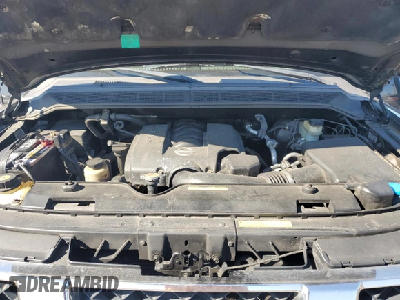 2006 Nissan Titan SE with VIN 1N6AA06A06N570395, listed as a Copart auction lot 48061925 with 131,059 mi miles and Salvage title. Bid and sale history available at DreamBid. Image 12.