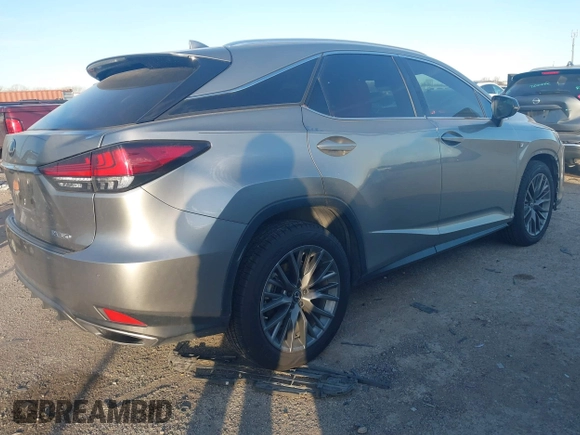 2022 Lexus RX with VIN 2T2YZMDA8NC326768, listed as a IAAI auction lot 41264390 with 36,217 mi miles. Bid and sale history available at carsss.com. Image 4.