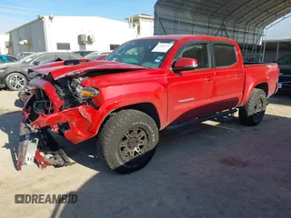 2017 Toyota Tacoma SR5 with VIN 5TFAZ5CN0HX047269, listed as a IAAI auction lot 41246731 with 99,456 mi miles and . Bid and sale history available at DreamBid. Image 2.