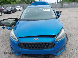 2015 Ford Focus SE z VIN 1FADP3F26FL252212, wystawiony jako IAAI lot #42345763 z przebiegiem 102 549 mil mil oraz . Historia ofert i sprzedaży dostępna na DreamBid. Obrazek 12.