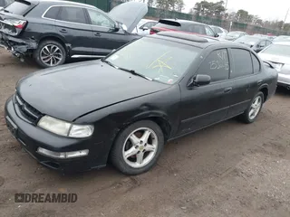 1998 Nissan Maxima GXE z VIN JN1CA21A7WM805575, wystawiony jako IAAI lot #41726198 z przebiegiem Nie podano mil oraz . Historia ofert i sprzedaży dostępna na DreamBid. Obrazek 2.