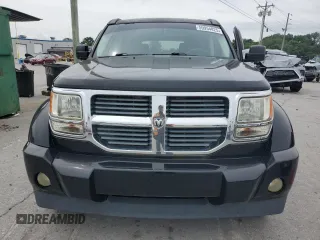 2007 Dodge Nitro SXT z VIN 1D8GU28K47W731172, wystawiony jako Copart lot #59954825 z przebiegiem 121 455 mil mil oraz Szkoda całkowita • Salvage title. Historia ofert i sprzedaży dostępna na DreamBid. Obrazek 5.