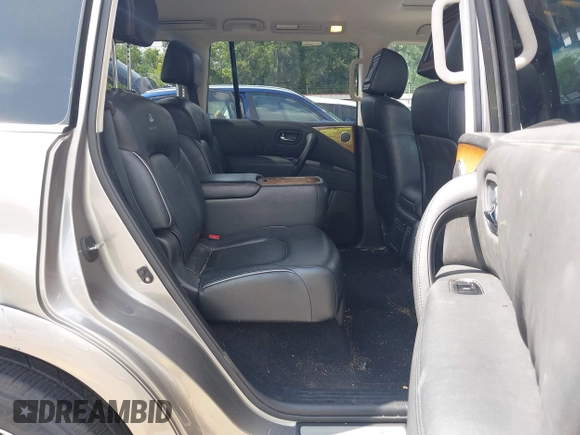 2012 Infiniti QX56 7-passenger z VIN JN8AZ2NF9C9517675, wystawiony jako IAAI lot #42138696 z przebiegiem 129 478 mil mil oraz . Historia ofert i sprzedaży dostępna na DreamBid. Obrazek 8.