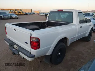 2003 Ford Ranger XL with VIN 1FTYR10U33PA51778, listed as a IAAI auction lot 42053678 with 216,513 mi miles. Bid and sale history available at carsss.com. Image 4.