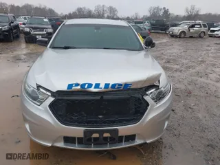 2015 Ford Sedan Police Interceptor with VIN 1FAHP2MK8FG190240, listed as a IAAI auction lot 41570580 with 131,158 mi miles. Bid and sale history available at carsss.com. Image 12.