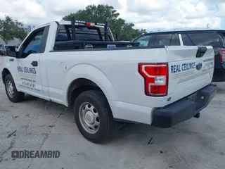 2018 Ford F-150 XL with VIN 1FTMF1CB0JFE21234, listed as a IAAI auction lot 42605399 with 243,035 mi miles and . Bid and sale history available at DreamBid. Image 3.