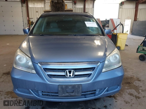 2007 Honda Odyssey EX-L z VIN 5FNRL38617B078923, wystawiony jako IAAI lot #42335122 z przebiegiem 154 352 mil mil oraz . Historia ofert i sprzedaży dostępna na DreamBid. Obrazek 12.
