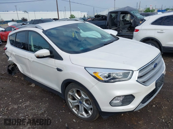 2019 Ford Escape Titanium with VIN 1FMCU9J97KUA03195, listed as a IAAI auction lot 42656589 with 40,099 mi miles and . Bid and sale history available at DreamBid. Image 1.