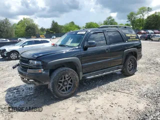 2003 Chevrolet Tahoe Z71 z VIN 1GNEK13ZX3R243046, wystawiony jako Copart lot #55496515 z przebiegiem 213 287 mil mil oraz Czysty tytuł • Clean title. Historia ofert i sprzedaży dostępna na DreamBid. Obrazek 1.